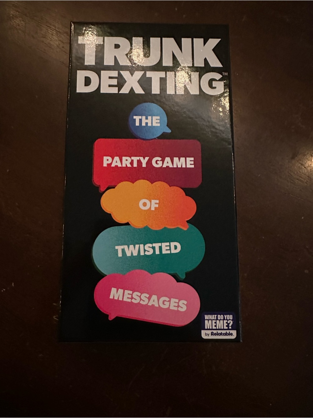 Trunk Dexting Party Game - Black Box with Colorful Text Bubbles